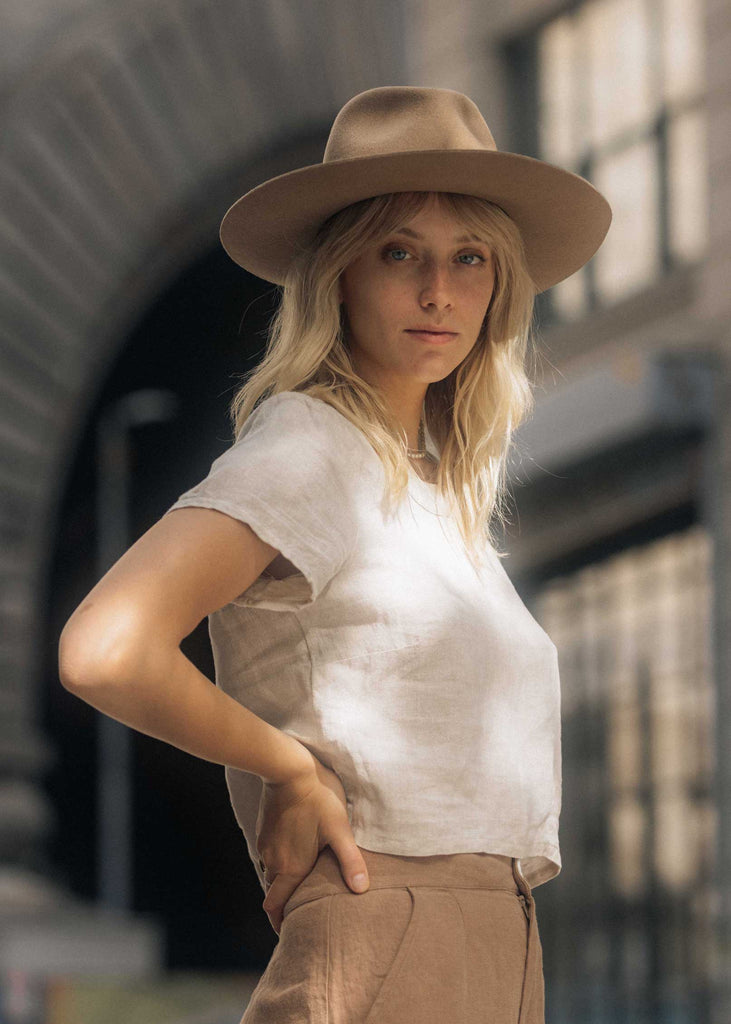 Our Augusta Top in Sand seen on Emma in New York.