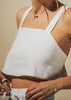Close up of the Talia Tank in white linen.